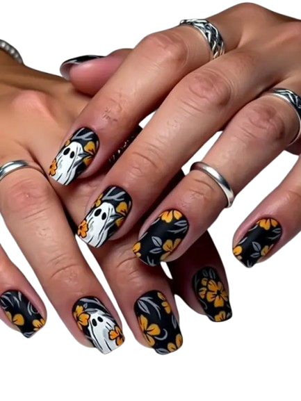 Chic fall nails designs featuring cute ghost patterns and orange floral art on a dark black base.